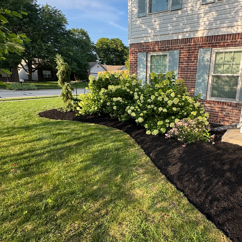 Mulch installation man and mower